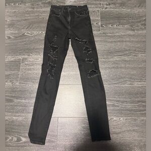 American Eagle black ripped “next level stretch” skinny jeans. Size 00